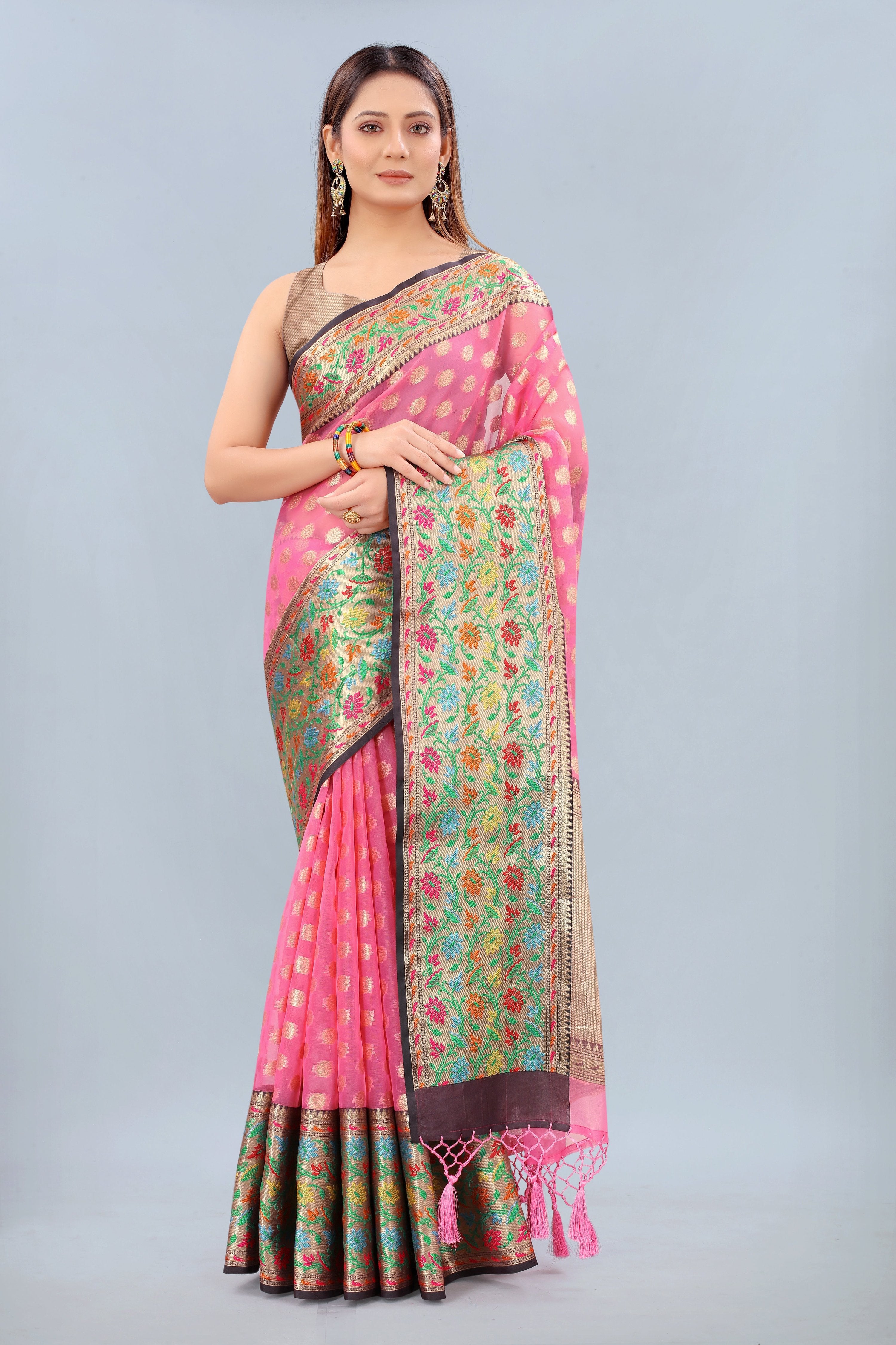 Elegant Pink Banarasi Art Silk saree with intricate woven traditional patterns.