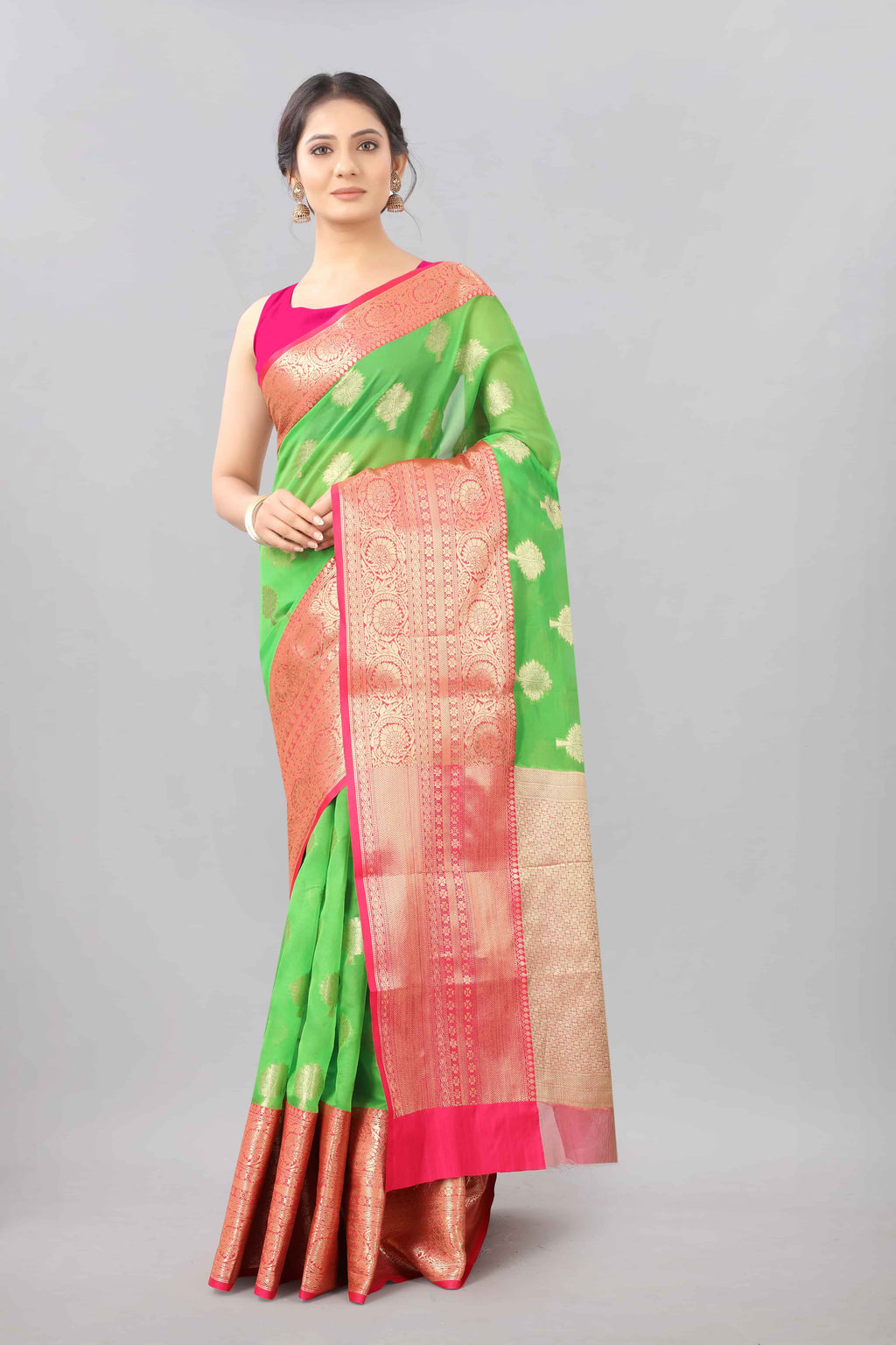 Green Banarasi silk blend saree with elegant floral woven patterns
