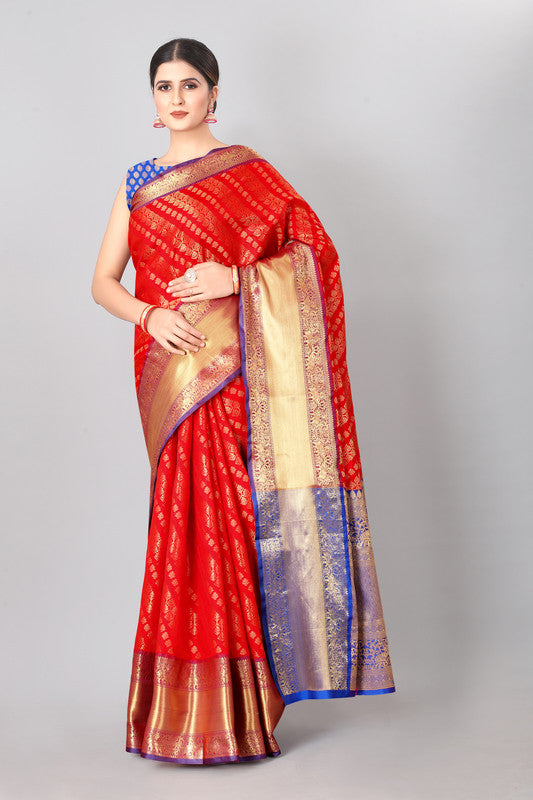 Red silk blend saree with abstract zari pattern and unstitched blouse