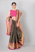 Black silk blend saree with woven gold zari stripes and matching unstitched blouse piece