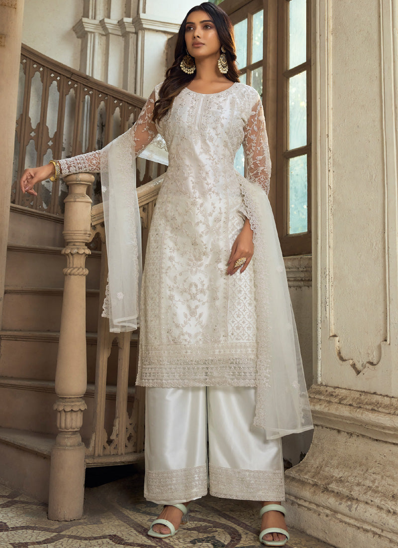 White premium net palazzo suit with traditional embroidery and long kurta.