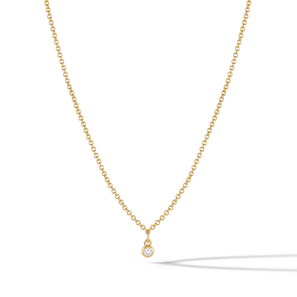 Polished 14k gold plated sapphire-style pendant necklace on a delicate chain.