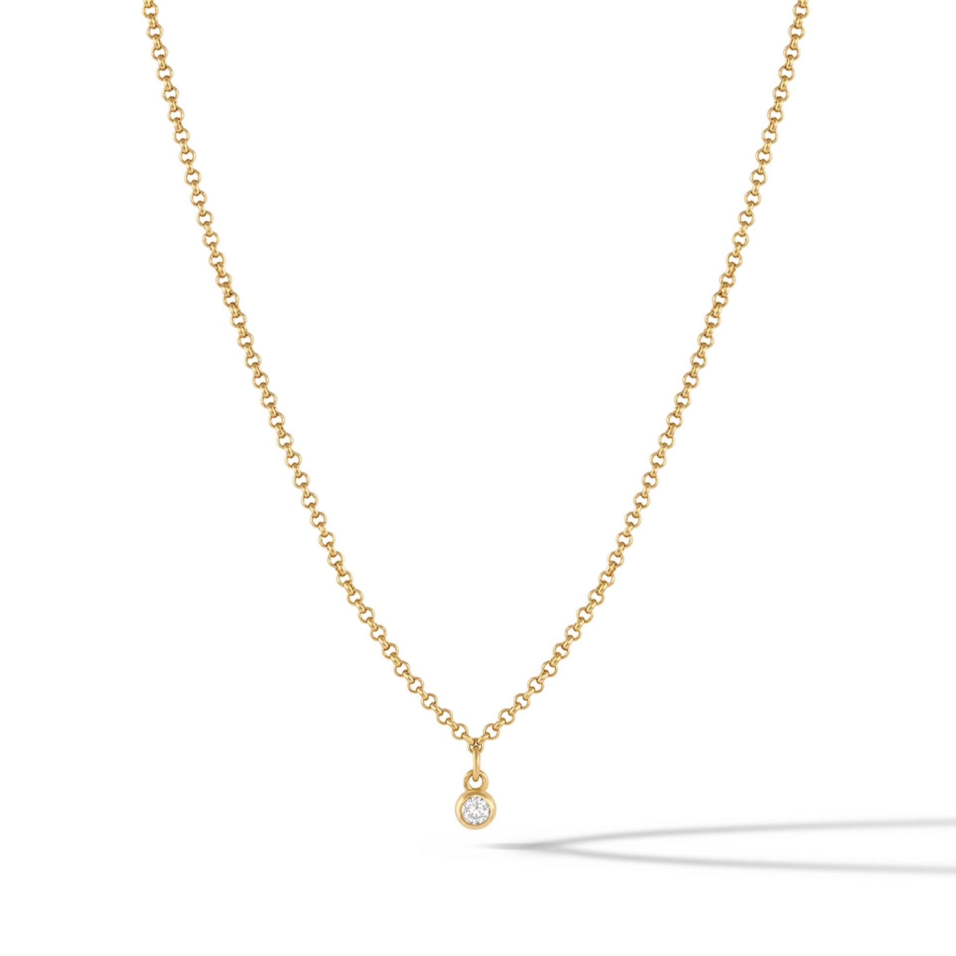 Polished 14k gold plated sapphire-style pendant necklace on a delicate chain.