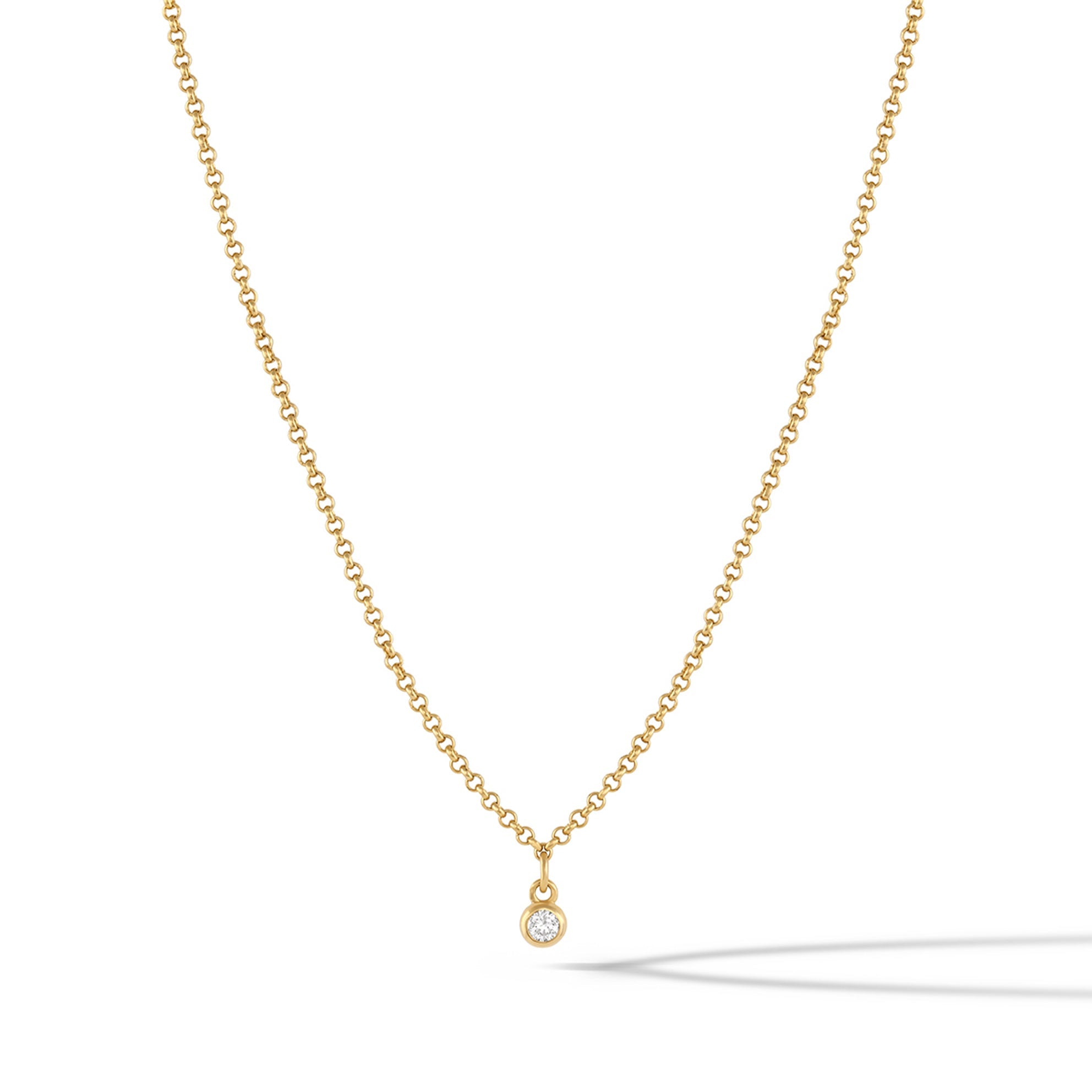 Polished 14k gold plated sapphire-style pendant necklace on a delicate chain.