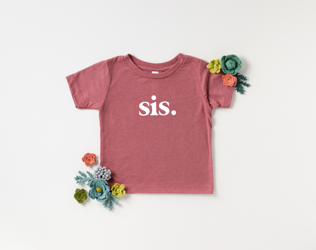 Unisex toddler tee in charcoal-heather with Sis. graphic design.