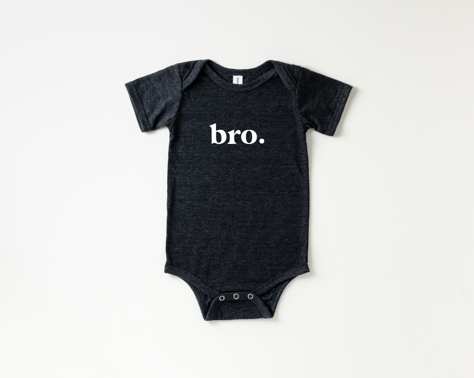 Minimalist Bro. infant onesie with snap leg closure in charcoal and olive green.
