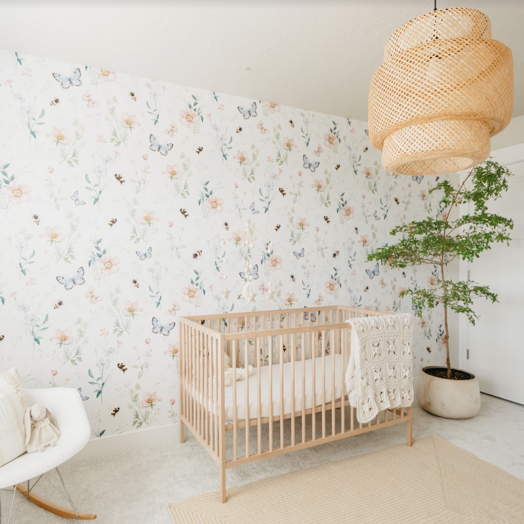 Cosette floral patterned wallpaper in white, pink, blue, and green for a cottagecore bedroom aesthetic.
