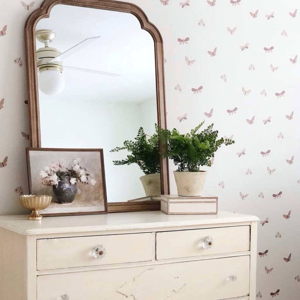 Bohemian minimalist wallpaper in cream, taupe, and brown.