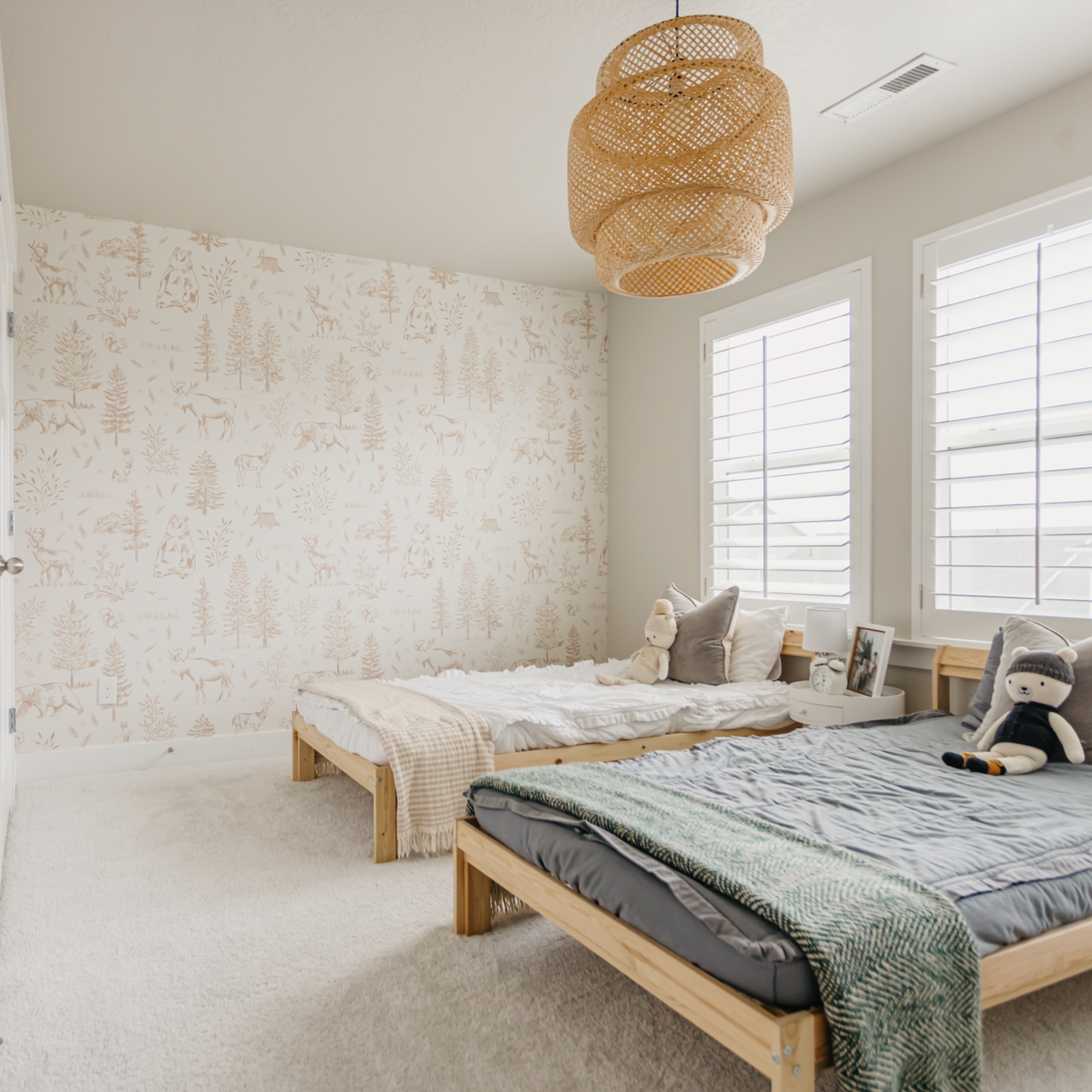 Gunnison wallpaper by Mariah Rose showcasing modern pattern design in a stylish room setting.