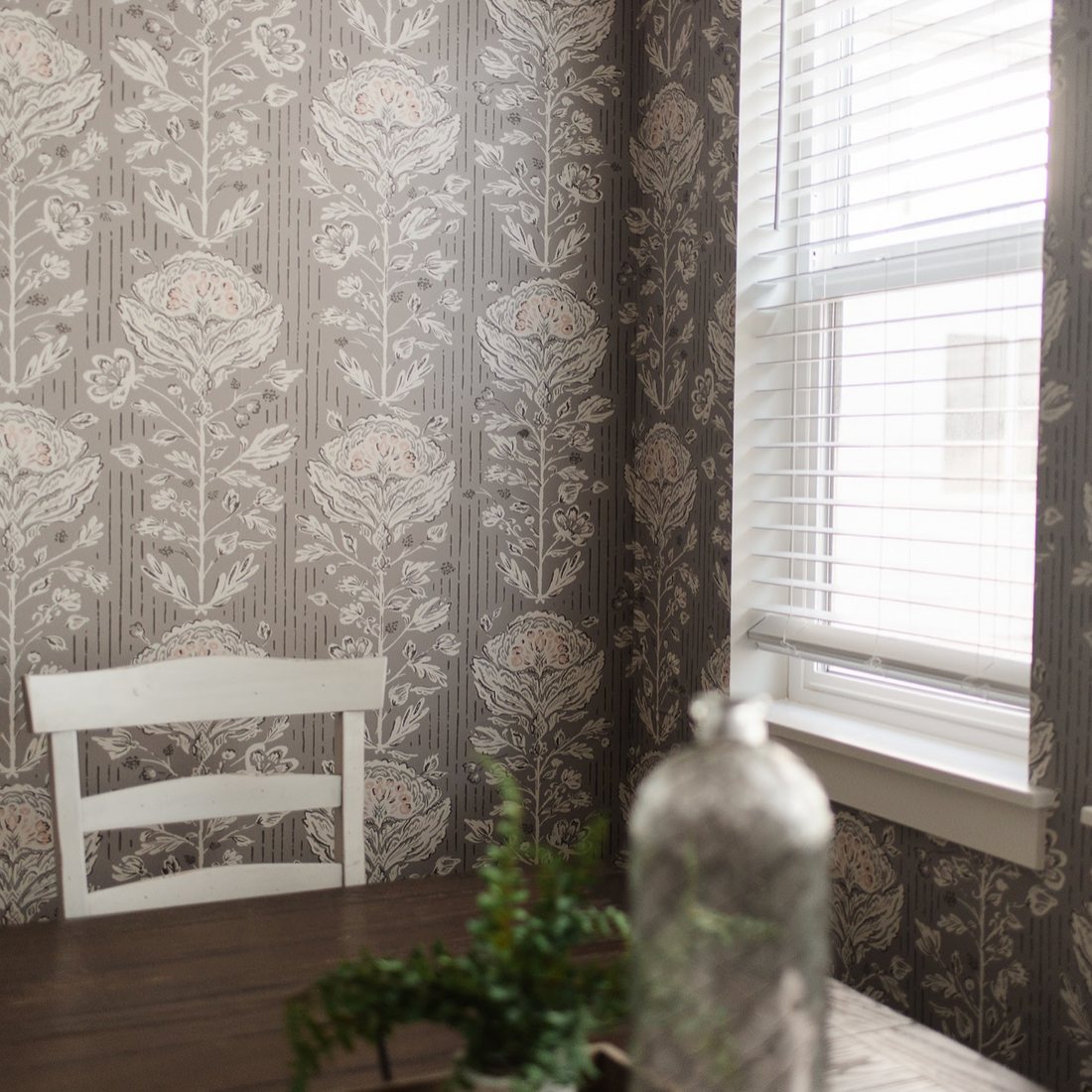 Maren botanical floral wallpaper in a traditional colorway of grey, white, and sage-green