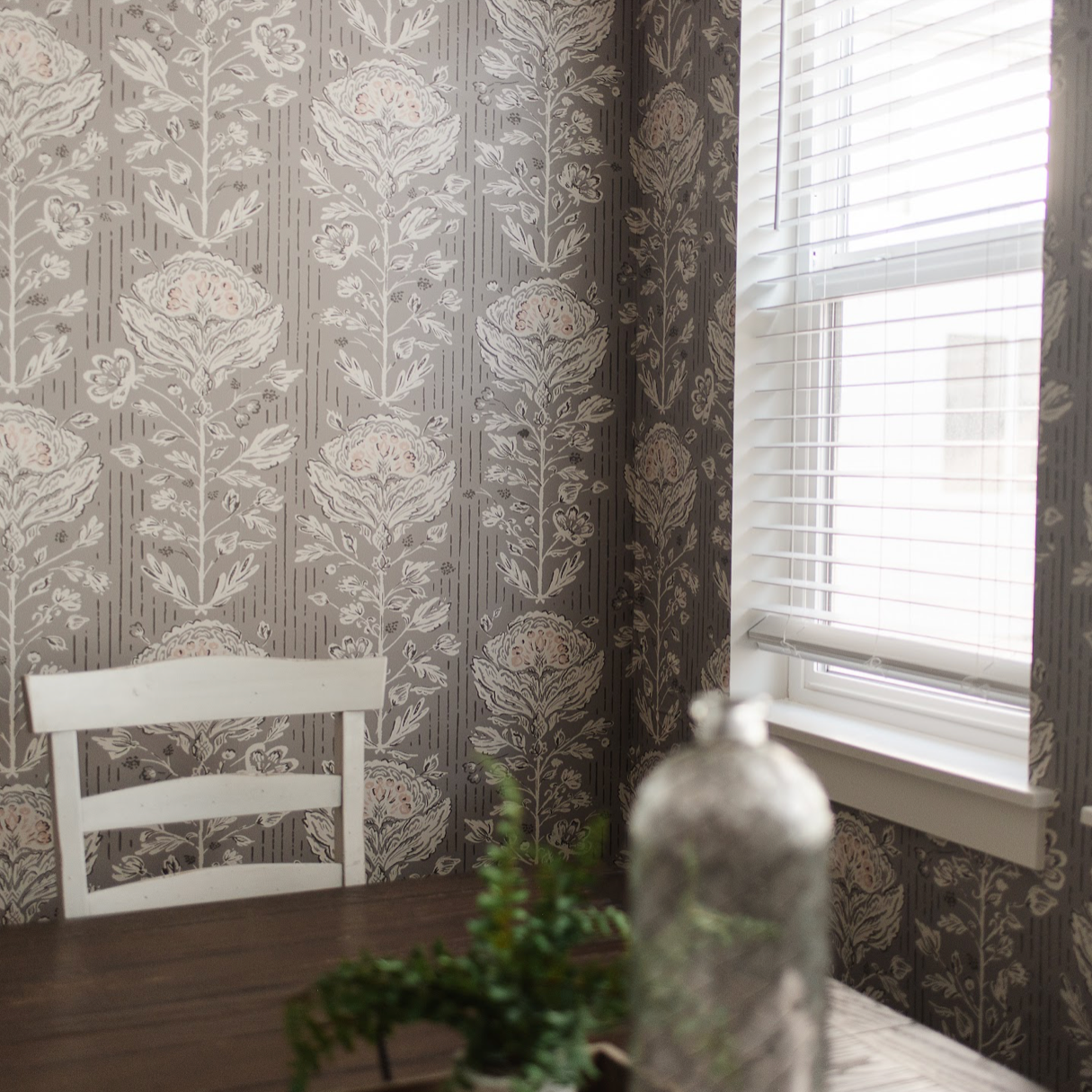 Maren botanical floral wallpaper in a traditional colorway of grey, white, and sage-green