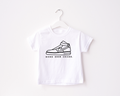 Streetwear style unisex t-shirt with Kicks Over Chicks graphic text.