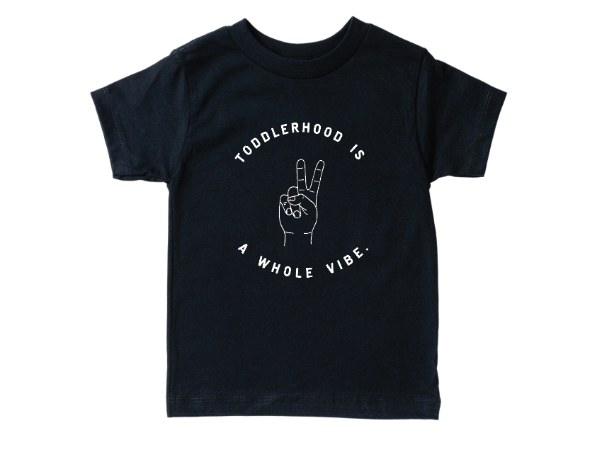 Minimalist toddler t-shirt in solid black or white.