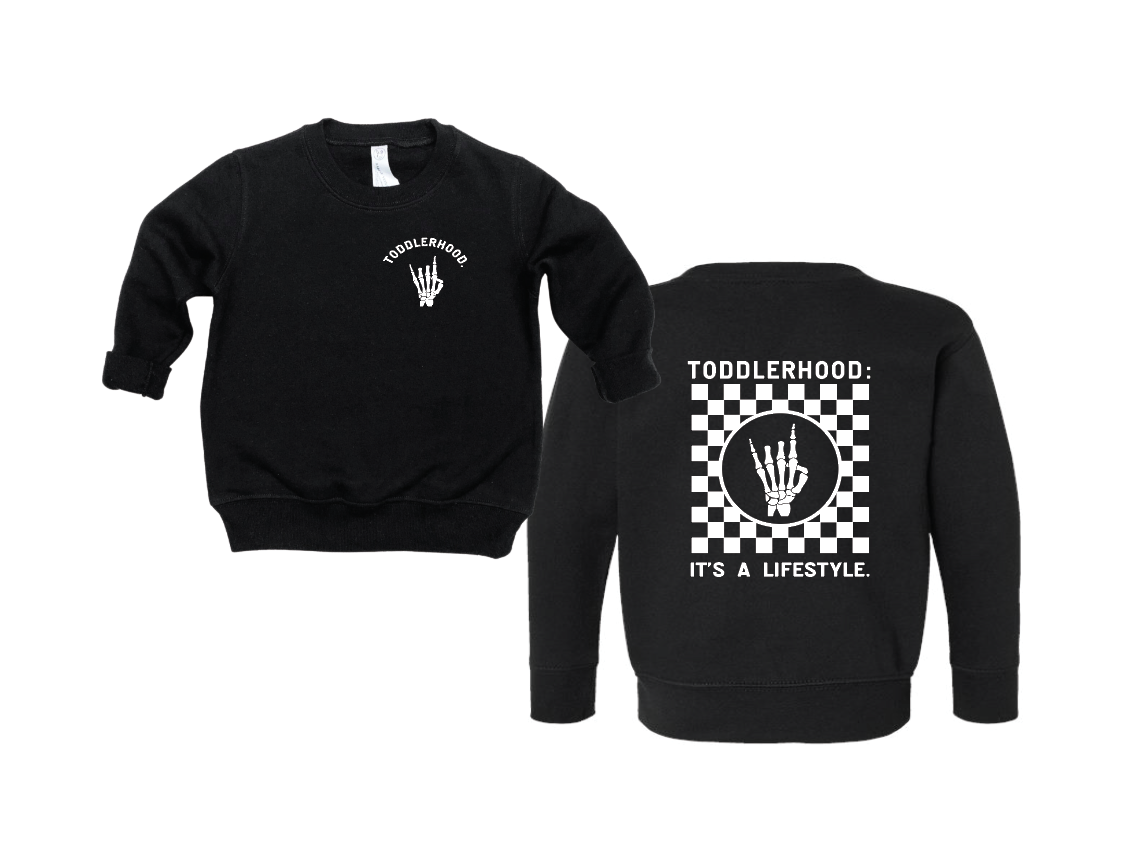 Toddler wearing a black Toddlerhood 'It's a Lifestyle' pullover sweatshirt