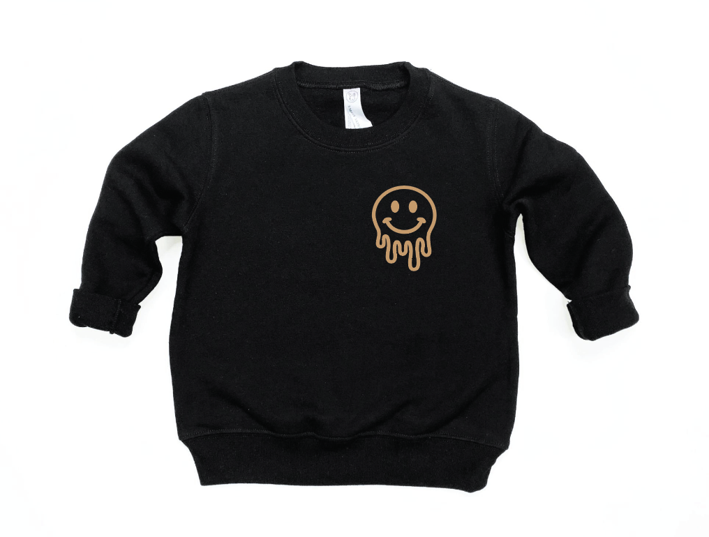 Drippy Smiley graphic pullover sweatshirt in black and tan knit fabric