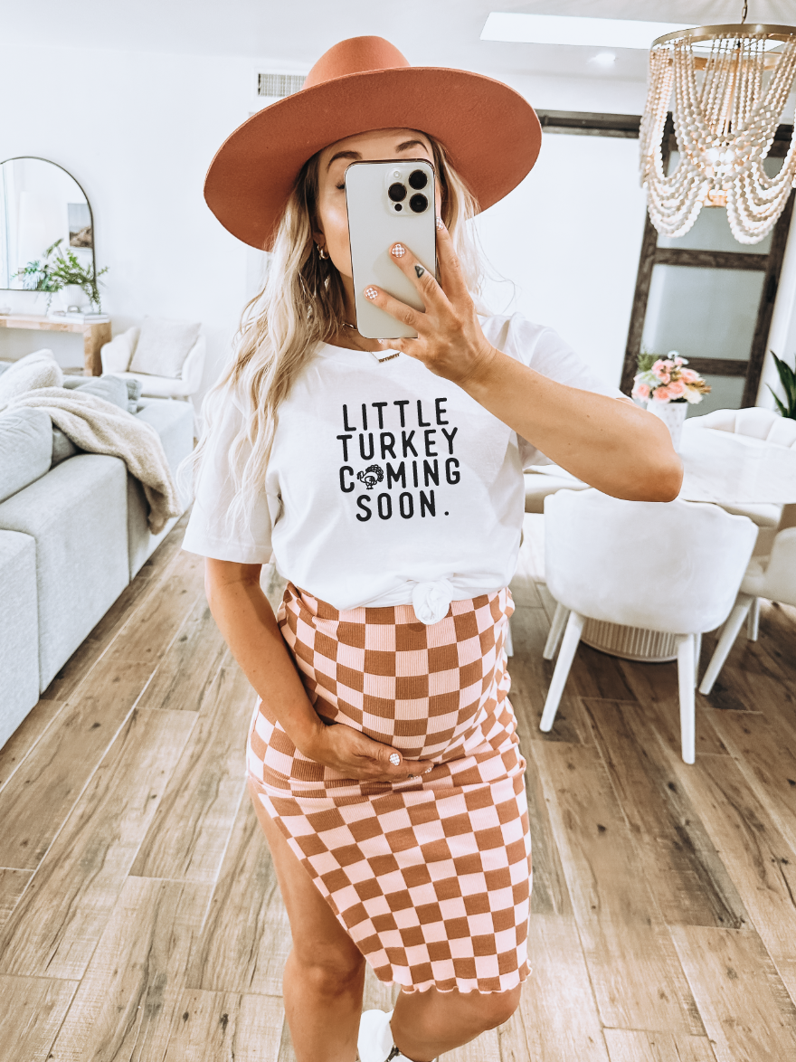 Little Turkey Coming Soon graphic maternity t-shirt in a relaxed unisex fit