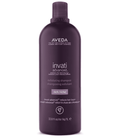 A large purple bottle of Aveda Invati Advanced Exfoliating Shampoo Rich for thinning hair