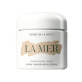 A luxury jar of The Moisturizing Cream, an ultra-rich treatment for skin rejuvenation and hydration.