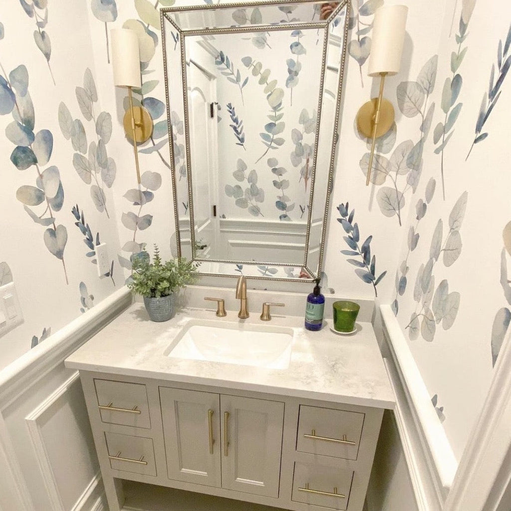 Lark floral pattern wallpaper in sage-green and blue-grey on a white background for coastal or farmhouse decor.