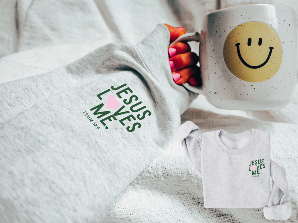 Women's relaxed fit knit pullover with Jesus Loves Me design