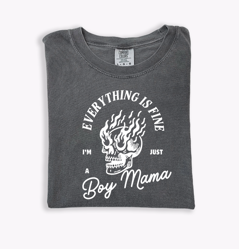 Women's charcoal and white graphic tee with 'Everything is Fine - I'm Just a Boy Mama' text.