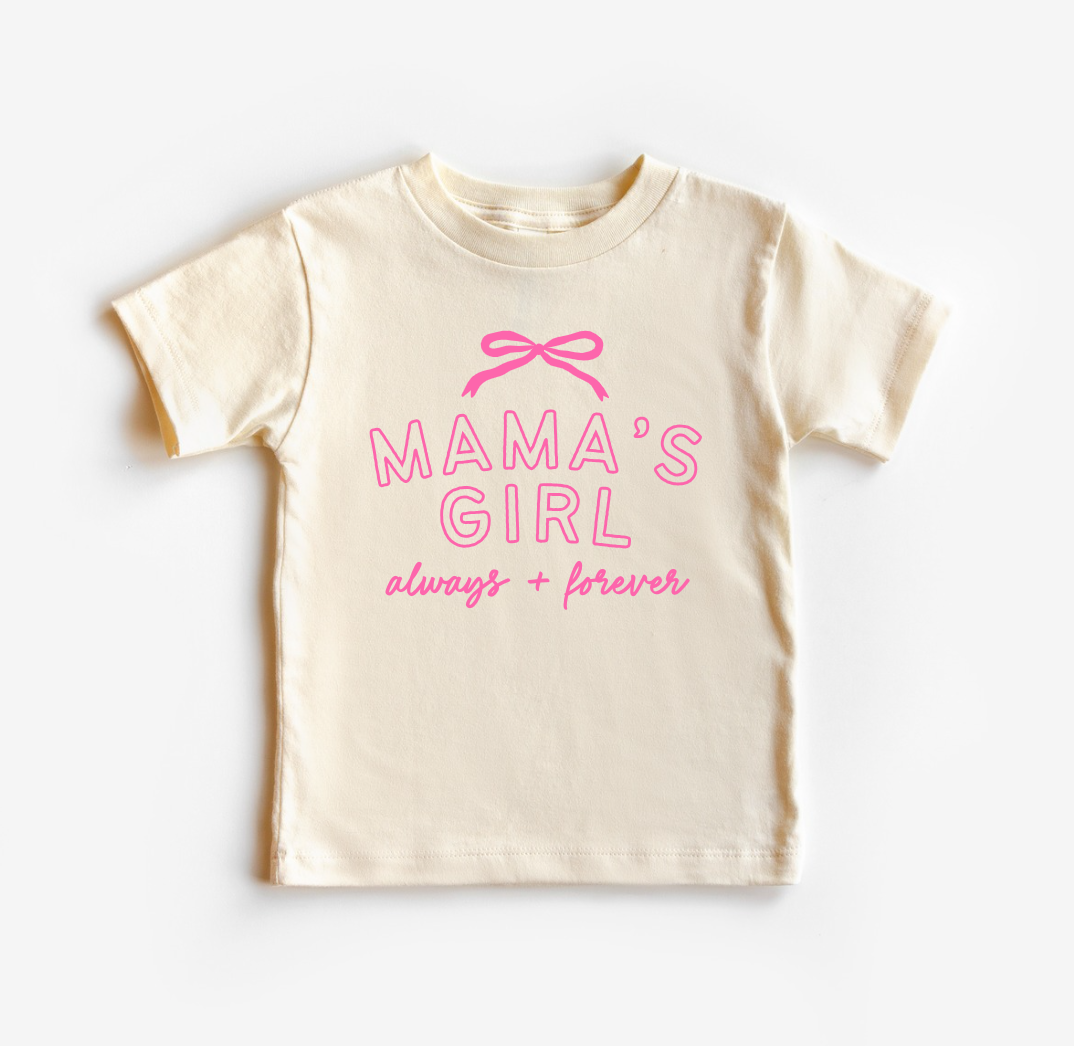 Child wearing Mama's Girl Always + Forever graphic tee in cream and pink