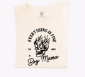 A cream-colored graphic t-shirt with the text Everything's Fine, I'm Just a Boy Mama Tee.