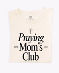 Woman wearing a Praying Mom's Club relaxed fit graphic t-shirt