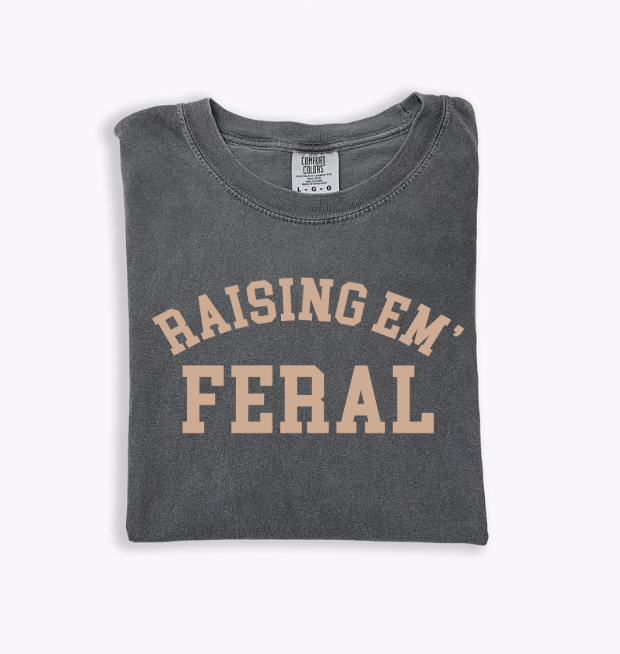 Unisex Raising Em Feral graphic tee made from heavyweight garment-dyed 100% cotton