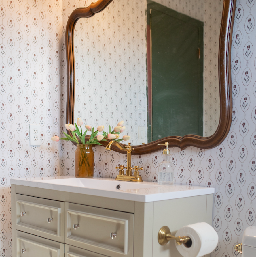 Isabella floral wallpaper in white, brown, and taupe with a traditional cottagecore vibe.