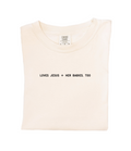 Relaxed fit 100% cotton graphic tee in off-white.