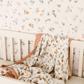 Fleurs Wallpaper featuring a beautiful floral pattern in a nursery setting