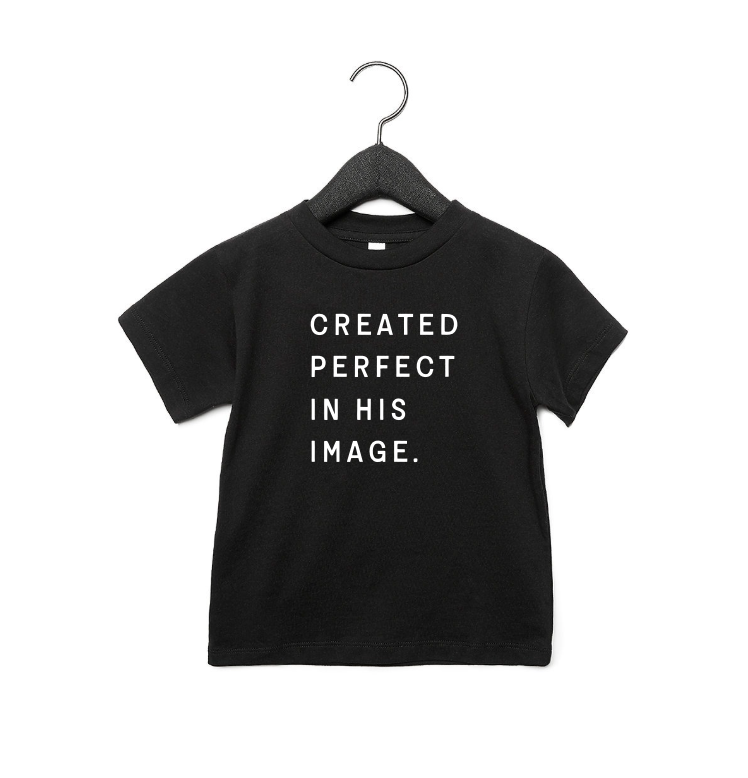 Kids wearing a minimalist short-sleeve crew neck tee with Created Perfect in His Image text