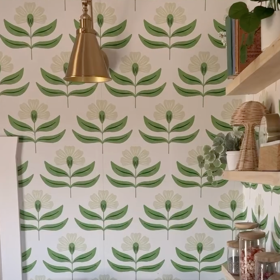Viv botanical wallpaper with white and green floral print, ideal for a Scandi-boho interior.