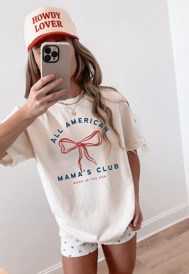 All American Mama's Club patriotic graphic t-shirt in off-white, red, and blue