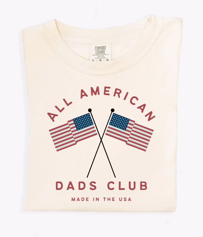 Unisex All American Dad's Club graphic tee in off-white, red, and blue cotton.