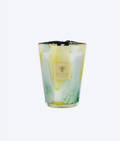 Baobab Collection Santo Sospir Max 24 candle in a hand-blown glass vessel with tangy yellow and green organic patterns.