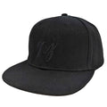 A solid black snapback hat with white NJ scripture embroidery, photographed on a neutral background.