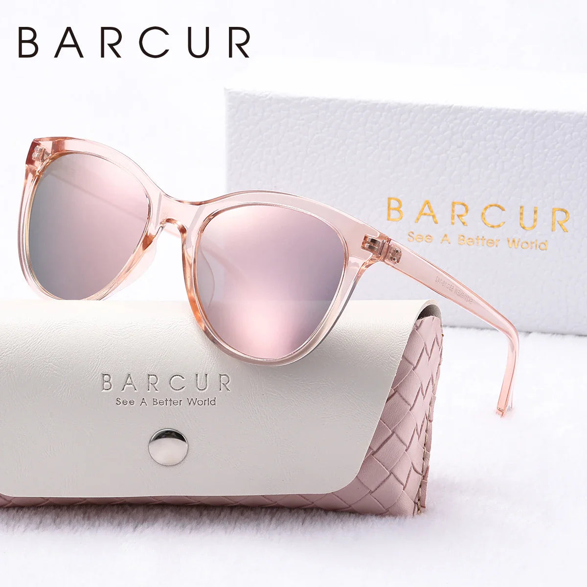 Women's transparent cat eye sunglasses in pink and black with polarized lenses.