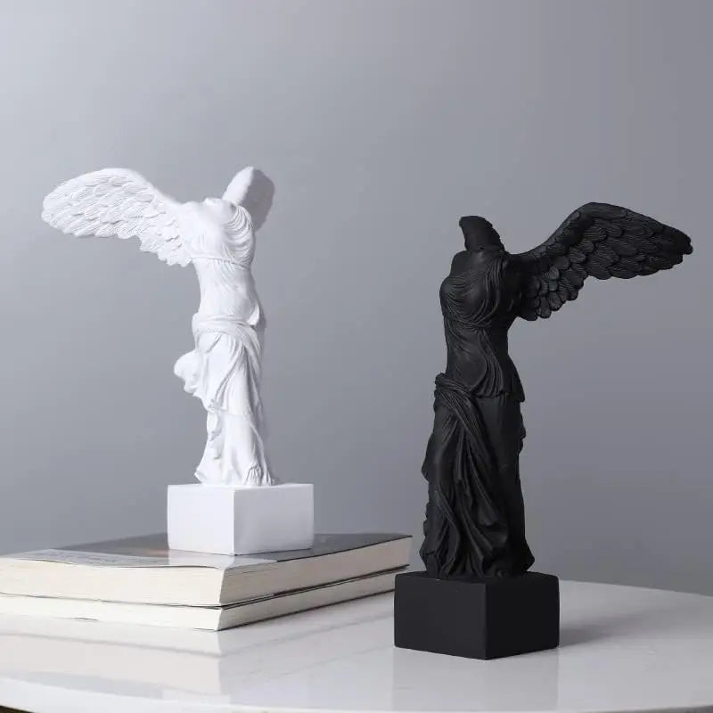 Winged Victory Goddess sculpture in resin displayed as home decor on a shelf