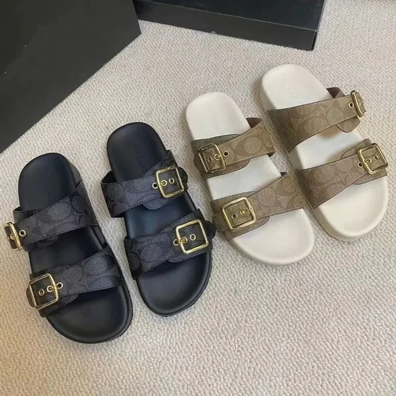 A pair of black and beige double buckle platform sandals with logo pattern design