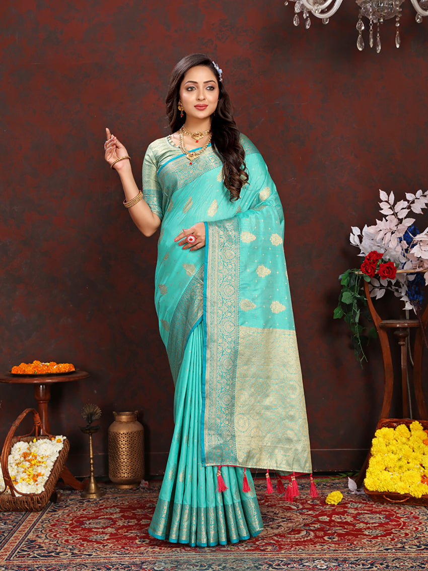 Seagreen Katan Silk saree with gold zari woven pallu and border, shown in a traditional draped style
