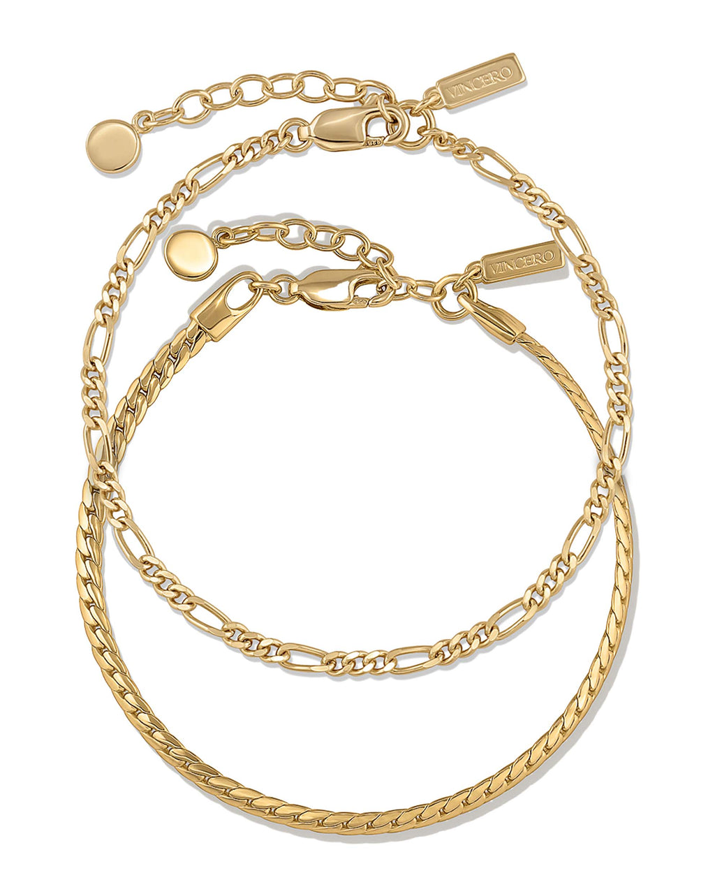 Serpentine Set in gold featuring a sleek, fluid chain design worn as a matching set.