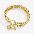 Coastal-style Shell and Starfish Double Stretch Bracelet with gold and white accents