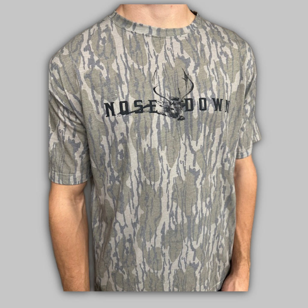 A grey and olive Mossy Oak Bottomland camo t-shirt with a crew neckline and short sleeves.
