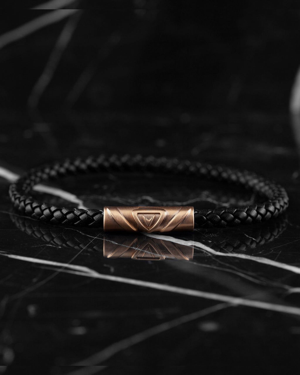 The Delta Single Leather Bracelet in Black and Rose Gold
