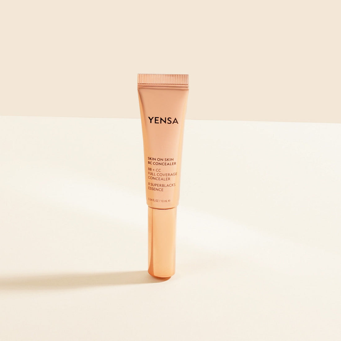 Yensa Skin On Skin BB CC Full Coverage Hyaluronic Serum Concealer tube and product texture swatch.