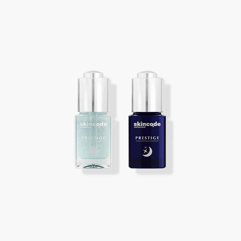 Skincode Skin Renaissance Ampoule Treatment bottles in clear and blue packaging.