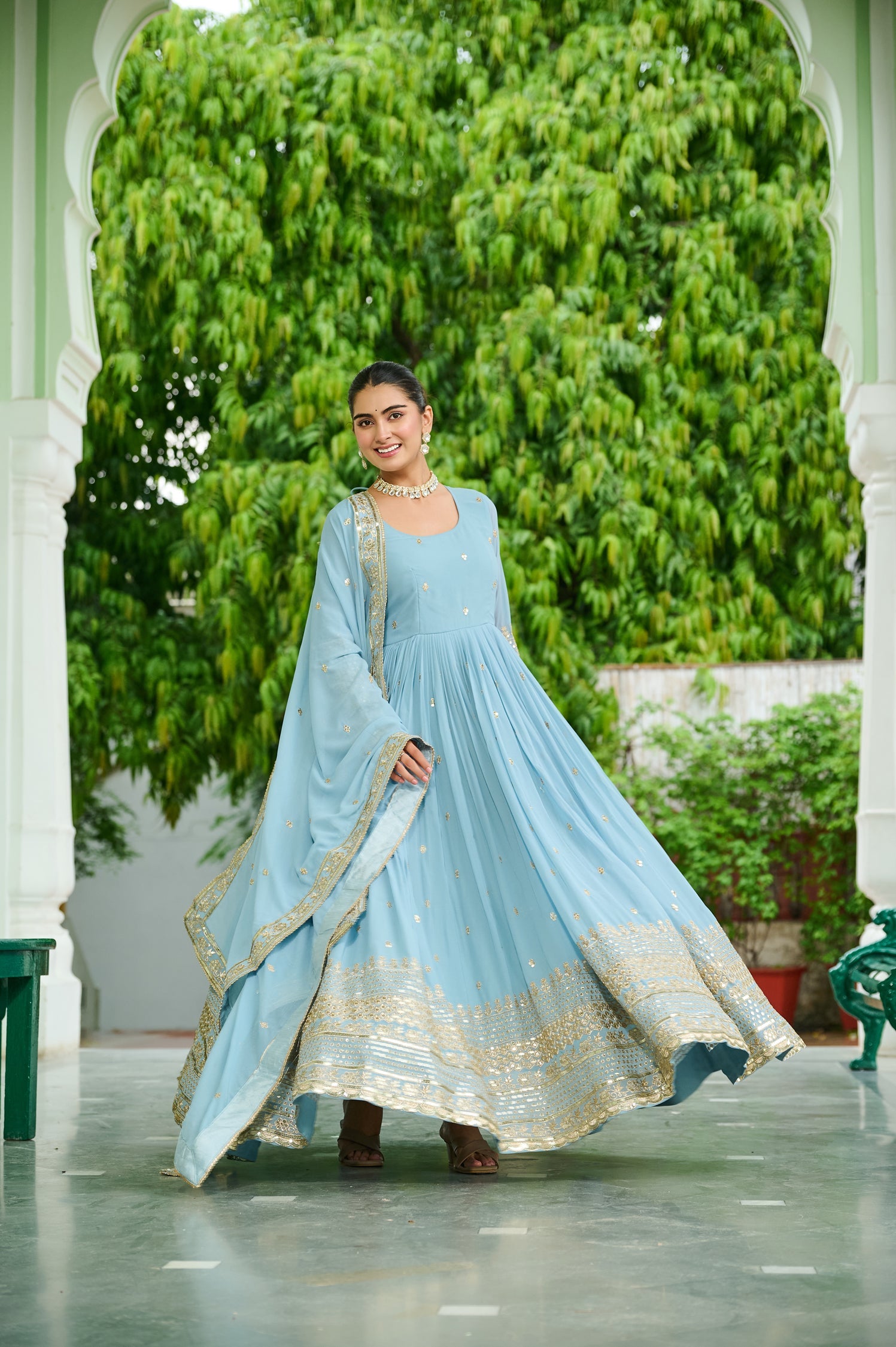 Skyblue faux georgette Anarkali gown with gold sequins and embroidery