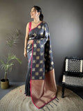 Grey soft silk Banarasi saree with elephant motifs and a red blouse piece